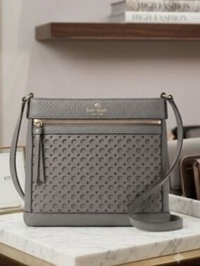 kate spade gray perforated leather crossbody with gold hardware